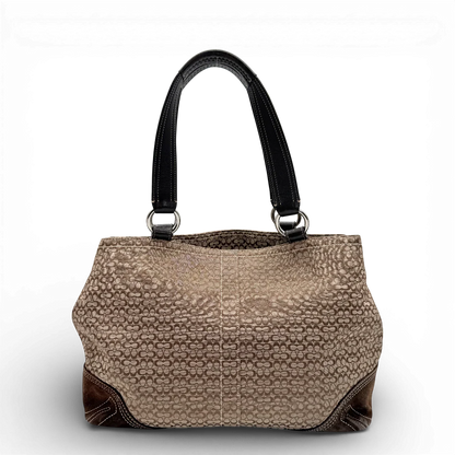 https://cdn.shopify.com/s/files/1/0564/9376/8855/files/Coach_Soho_Tote_Handtasche_monogram_braun___beige_vintage_1244.webp?v=1771415165