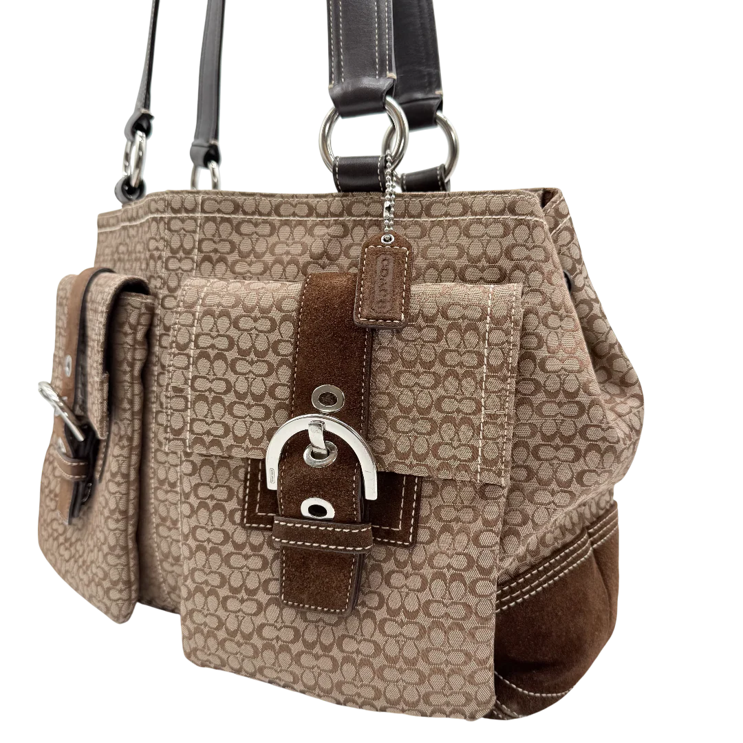 https://cdn.shopify.com/s/files/1/0564/9376/8855/files/Coach_Soho_Tote_Handtasche_monogram_braun___beige_vintage_1247.webp?v=1771415165