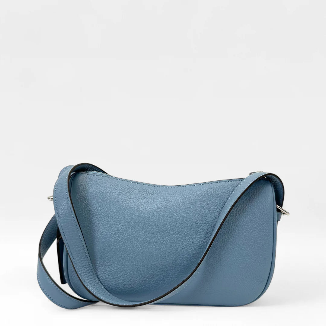 https://cdn.shopify.com/s/files/1/0564/9376/8855/files/Coach_Umhangetasche_rechteckig_aus_Leder_blau_crossbody9518.webp?v=1761265797