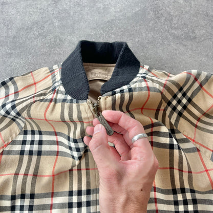 Burberry’s 1990s reversible nova check bomber jacket (S)