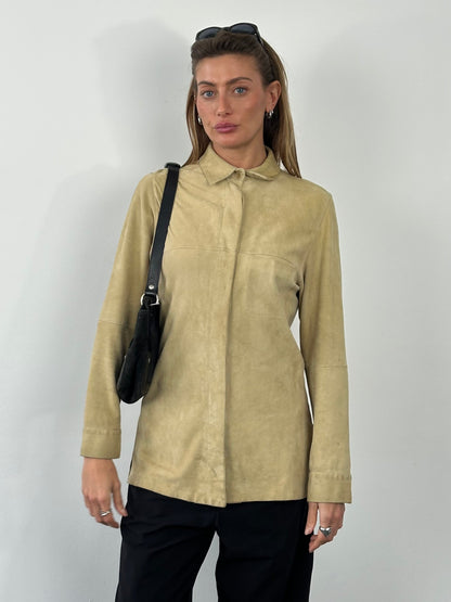 Marella 1990s suede minimal shirt in tan color, featuring a classic collar and long sleeves, displayed on a hanger.
