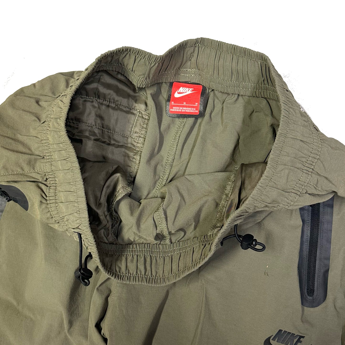 Nike Woven Tech Loose Fit Bottoms In Khaki Green ( M )
