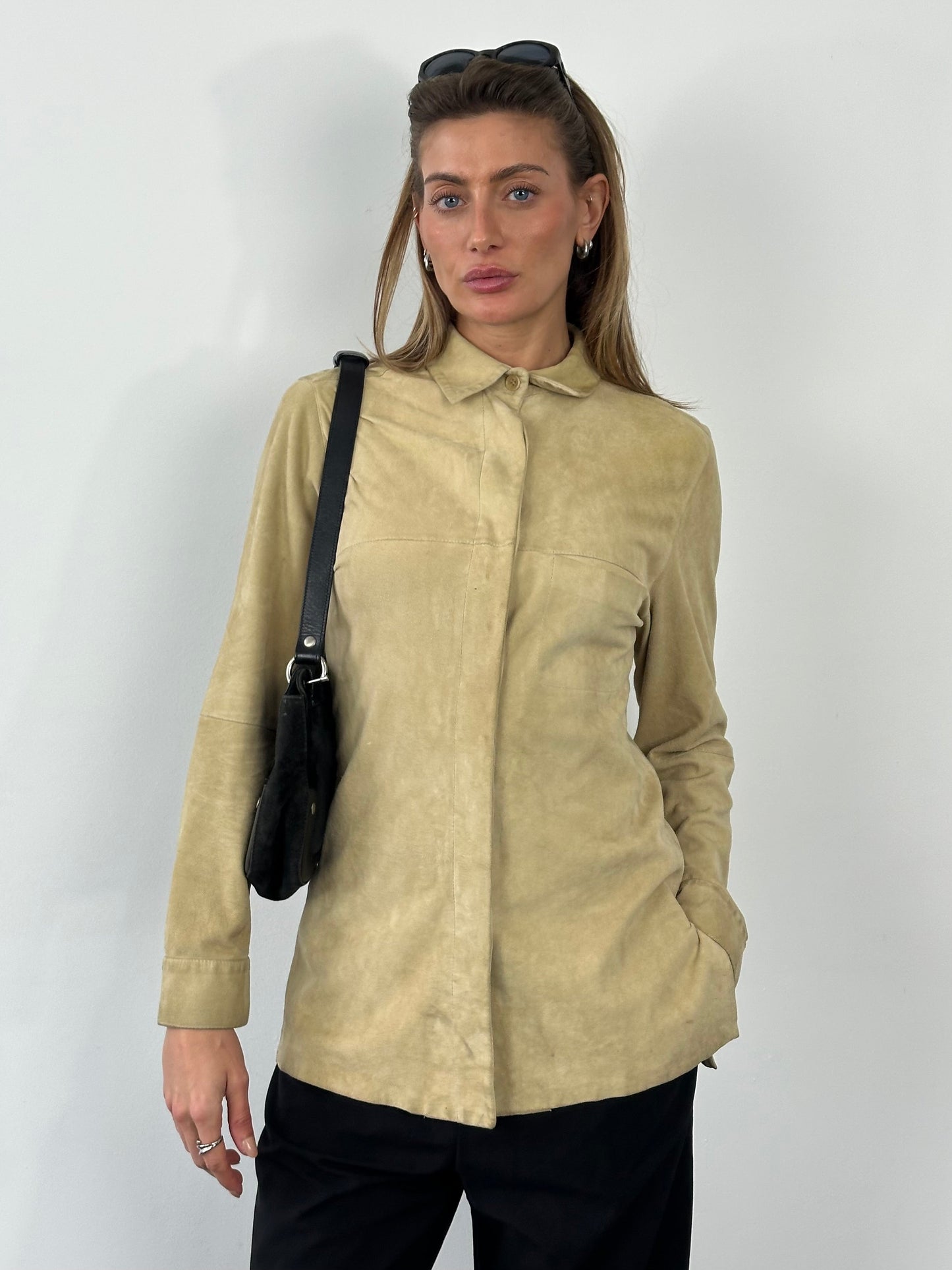 Marella 1990s suede minimal shirt in tan, featuring a classic collar and long sleeves, laid flat for display.