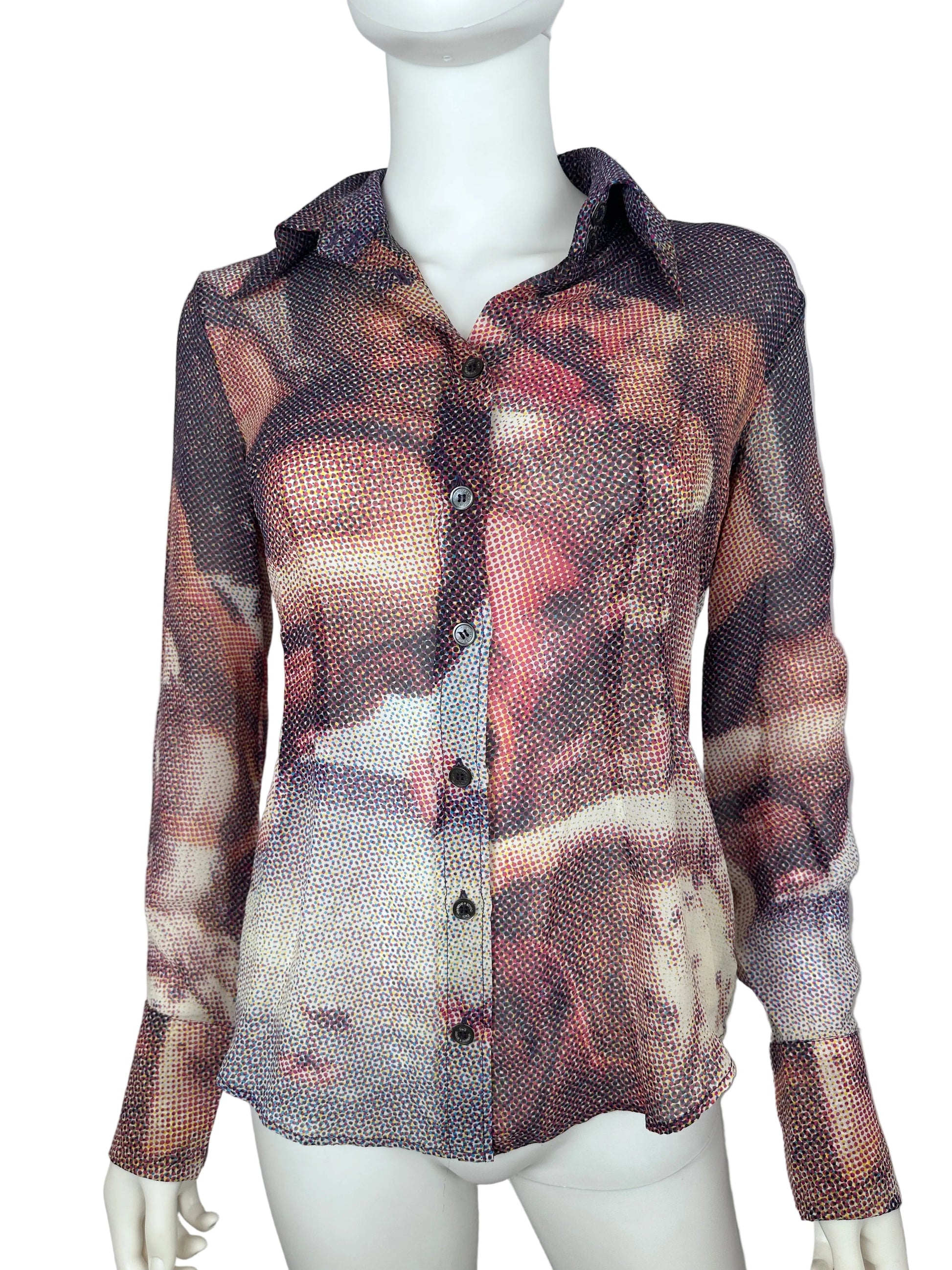 A long-sleeve button-front top displayed on a white mannequin torso, featuring an abstract painterly print in muted brown, beige, gray, and pink tones.