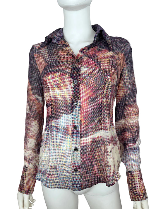 A long-sleeve button-front top displayed on a white mannequin torso, featuring an abstract painterly print in muted brown, beige, gray, and pink tones.