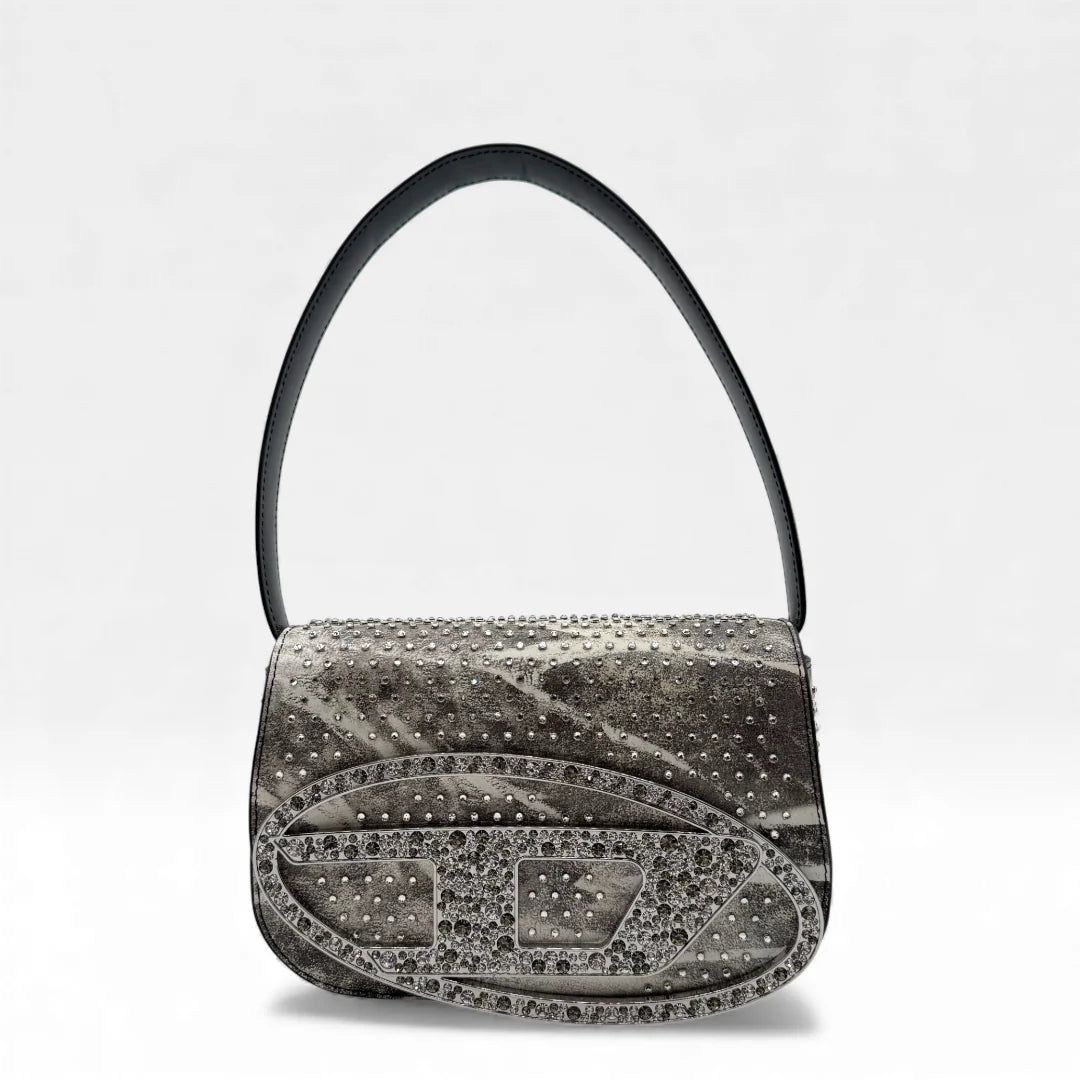 https://cdn.shopify.com/s/files/1/0564/9376/8855/files/Diesel_Schultertasche_1DR_crystal_multicolor_leder_5675.webp?v=1765451622