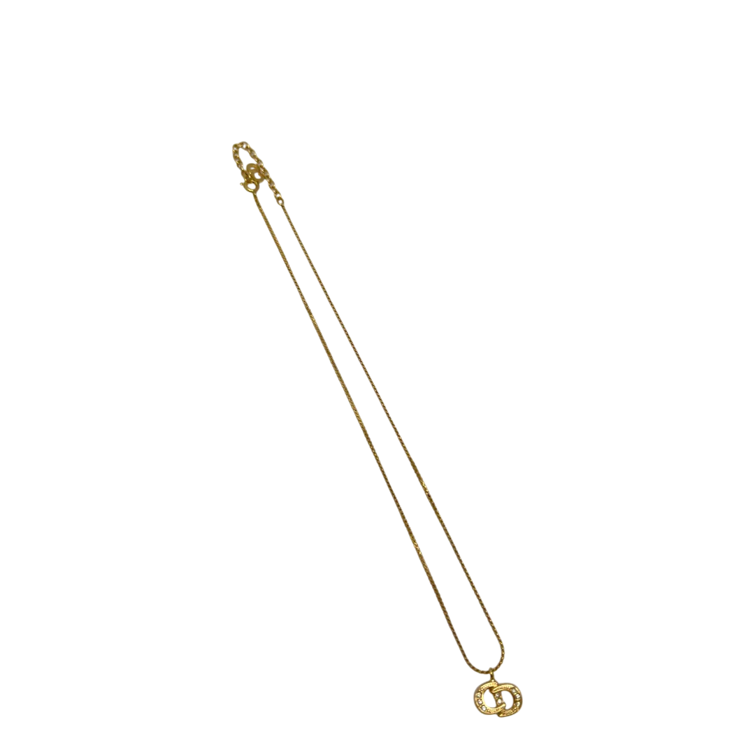 https://cdn.shopify.com/s/files/1/0564/9376/8855/files/Dior_Halskette_mit_Strasssteinen_gold_vintage7764.webp?v=1779406149