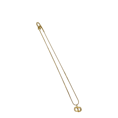 https://cdn.shopify.com/s/files/1/0564/9376/8855/files/Dior_Halskette_mit_Strasssteinen_gold_vintage7764.webp?v=1779406149