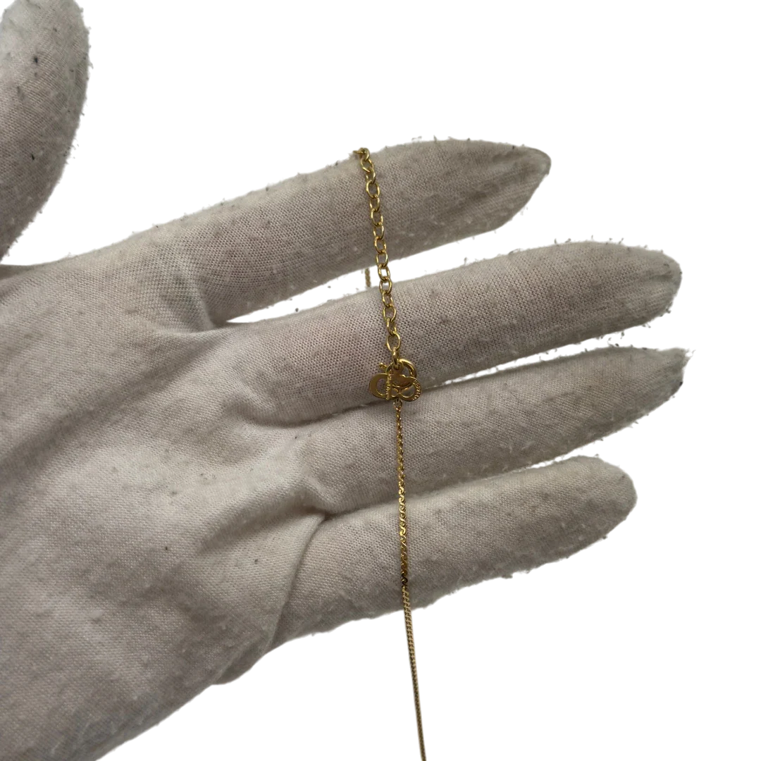 https://cdn.shopify.com/s/files/1/0564/9376/8855/files/Dior_Halskette_mit_Strasssteinen_gold_vintage7766.webp?v=1779406149