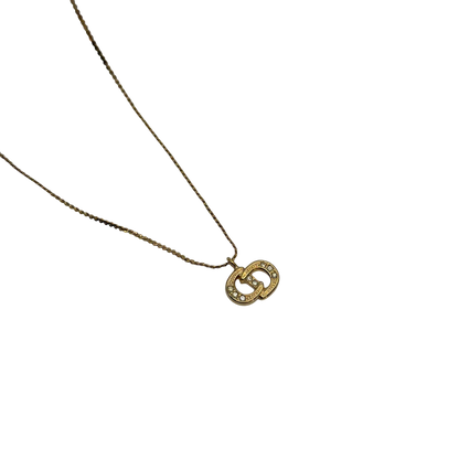 https://cdn.shopify.com/s/files/1/0564/9376/8855/files/Dior_Halskette_mit_Strasssteinen_gold_vintage7767.webp?v=1779406149