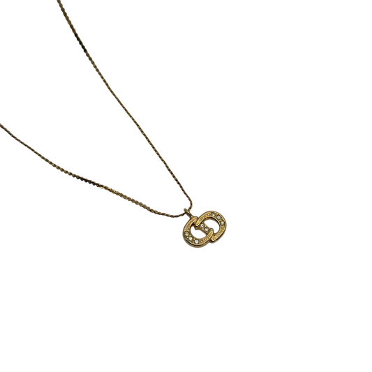 https://cdn.shopify.com/s/files/1/0564/9376/8855/files/Dior_Halskette_mit_Strasssteinen_gold_vintage7767.webp?v=1779406149