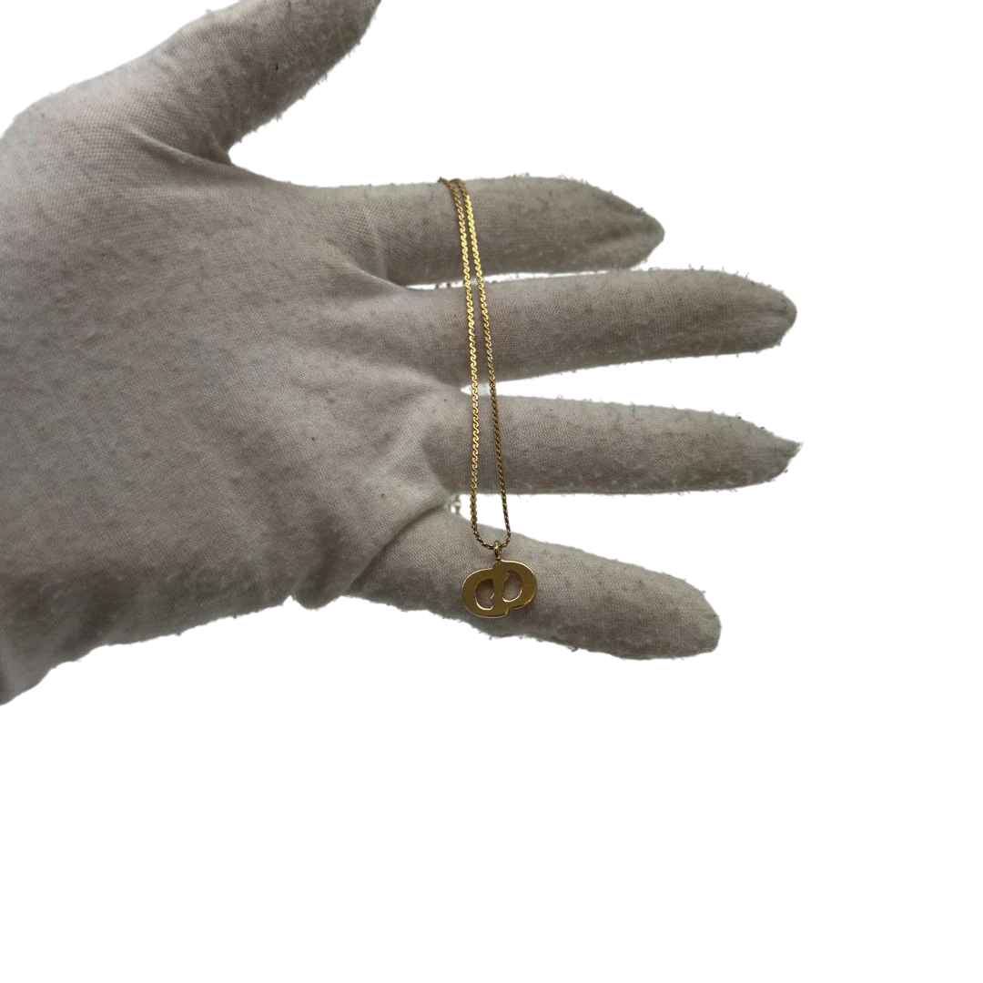 https://cdn.shopify.com/s/files/1/0564/9376/8855/files/Dior_Halskette_mit_Strasssteinen_gold_vintage7770.webp?v=1779406149