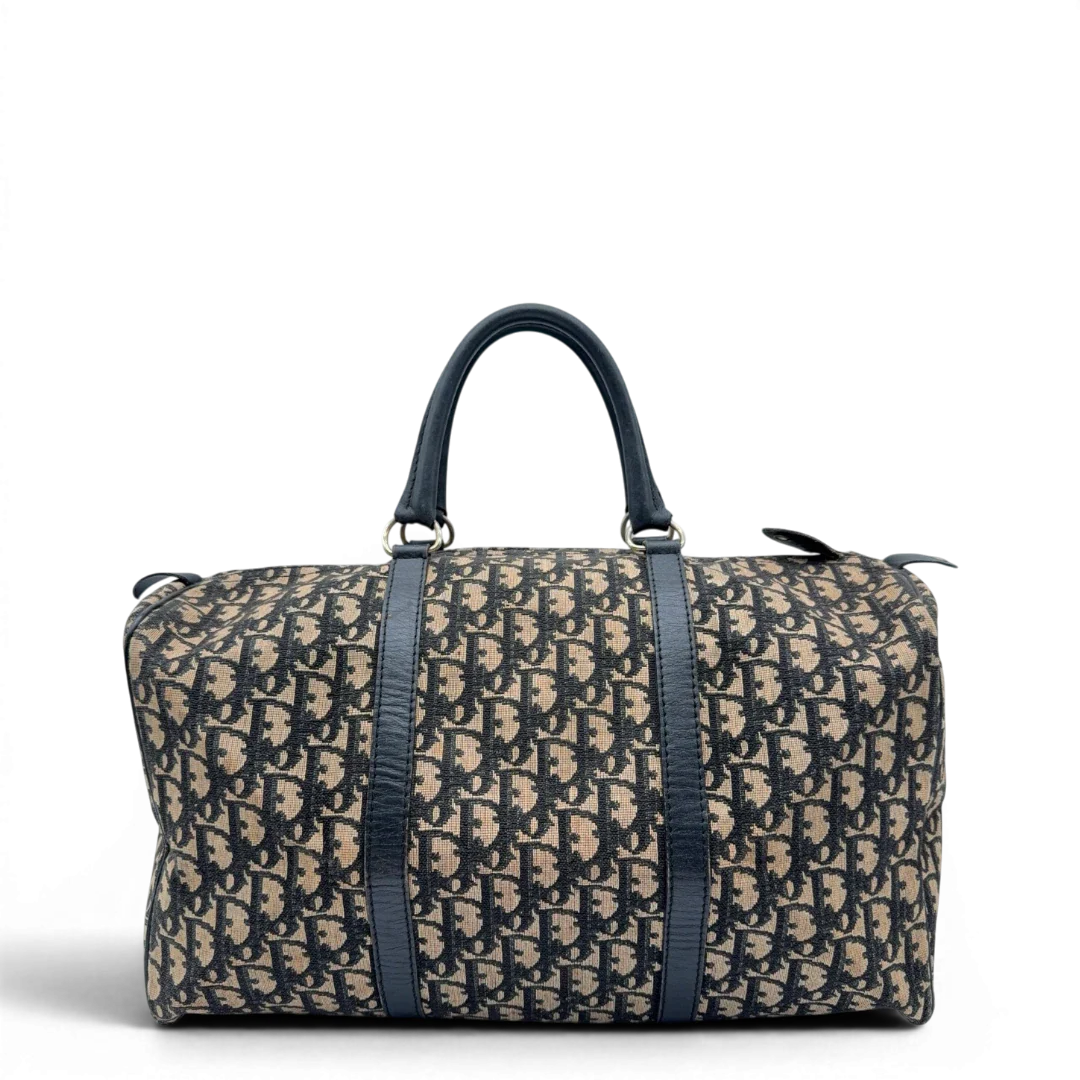 https://cdn.shopify.com/s/files/1/0564/9376/8855/files/Dior_Handtasche_Boston_40_vintage_monogram_beige___blau_1.webp?v=1784124989