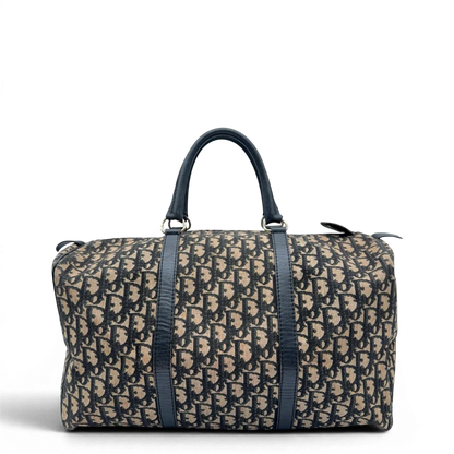 https://cdn.shopify.com/s/files/1/0564/9376/8855/files/Dior_Handtasche_Boston_40_vintage_monogram_beige___blau_1.webp?v=1784124989