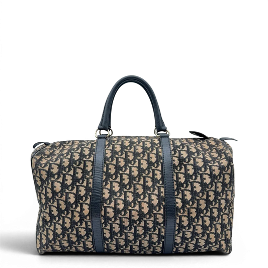 https://cdn.shopify.com/s/files/1/0564/9376/8855/files/Dior_Handtasche_Boston_40_vintage_monogram_beige___blau_1.webp?v=1784124989