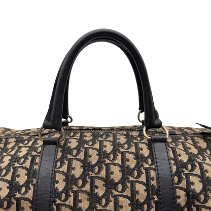 https://cdn.shopify.com/s/files/1/0564/9376/8855/files/Dior_Handtasche_Boston_40_vintage_monogram_beige___blau_11.webp?v=1784124989
