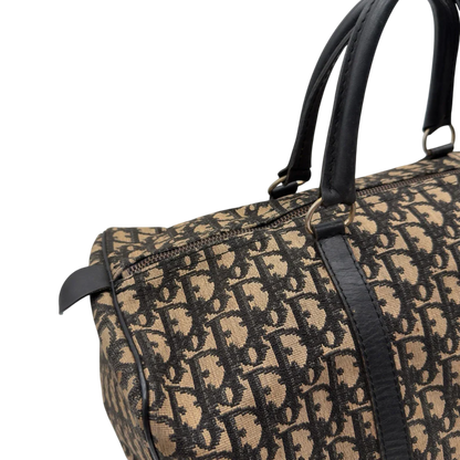 https://cdn.shopify.com/s/files/1/0564/9376/8855/files/Dior_Handtasche_Boston_40_vintage_monogram_beige___blau_12.webp?v=1784124989