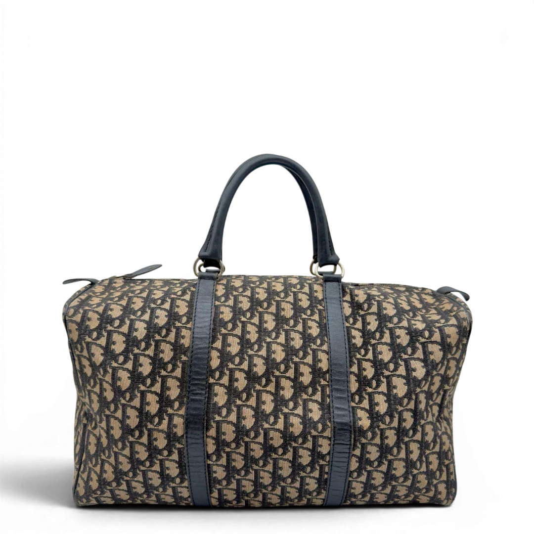https://cdn.shopify.com/s/files/1/0564/9376/8855/files/Dior_Handtasche_Boston_40_vintage_monogram_beige___blau_2.webp?v=1784124989