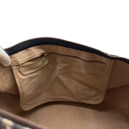https://cdn.shopify.com/s/files/1/0564/9376/8855/files/Dior_Handtasche_Boston_40_vintage_monogram_beige___blau_21.webp?v=1784124989