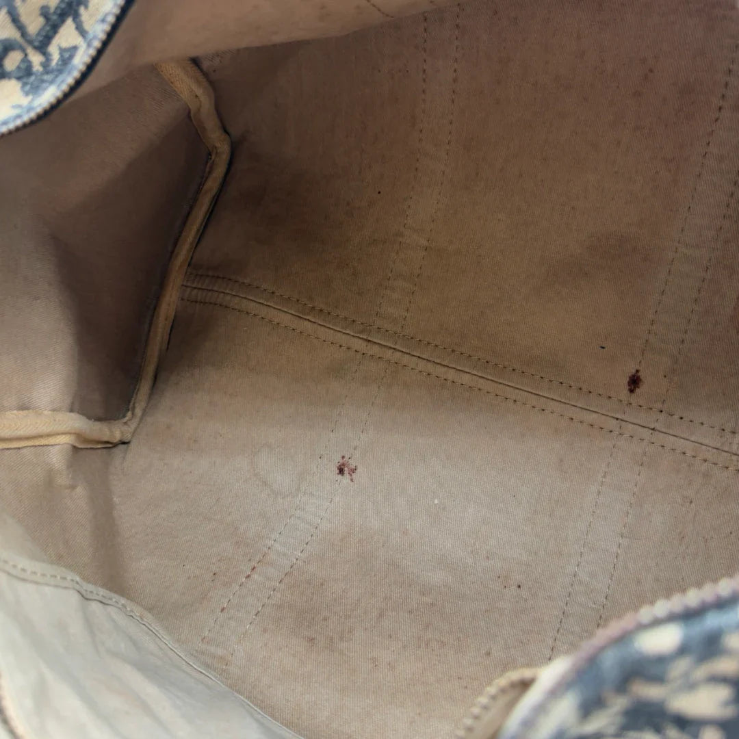https://cdn.shopify.com/s/files/1/0564/9376/8855/files/Dior_Handtasche_Boston_40_vintage_monogram_beige___blau_26.webp?v=1784124989