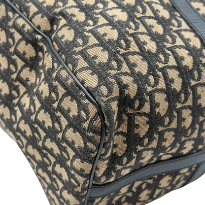 https://cdn.shopify.com/s/files/1/0564/9376/8855/files/Dior_Handtasche_Boston_40_vintage_monogram_beige___blau_9.webp?v=1784124989