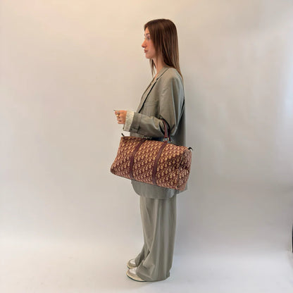 https://cdn.shopify.com/s/files/1/0564/9376/8855/files/Dior_Handtasche_Boston_40_vintage_monogram_beige_rotIMG_1286.webp?v=1784247348