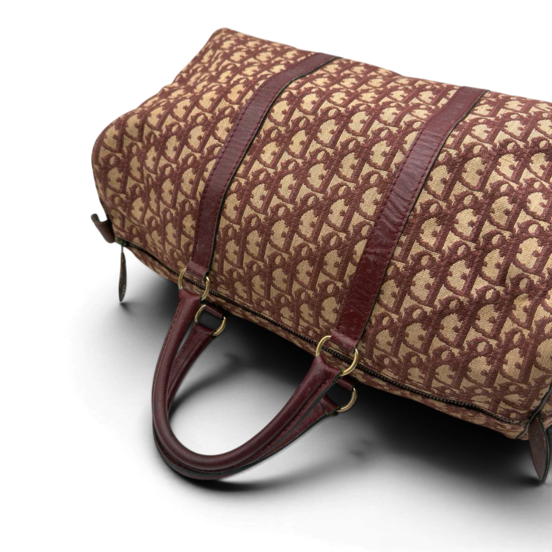 https://cdn.shopify.com/s/files/1/0564/9376/8855/files/Dior_Handtasche_Boston_40_vintage_monogram_beige_rot_10.webp?v=1784247348