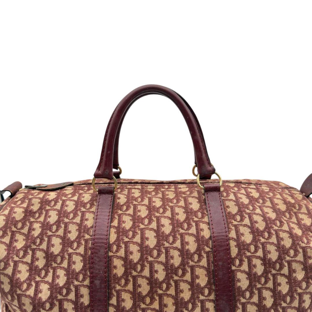 https://cdn.shopify.com/s/files/1/0564/9376/8855/files/Dior_Handtasche_Boston_40_vintage_monogram_beige_rot_11.webp?v=1784247347