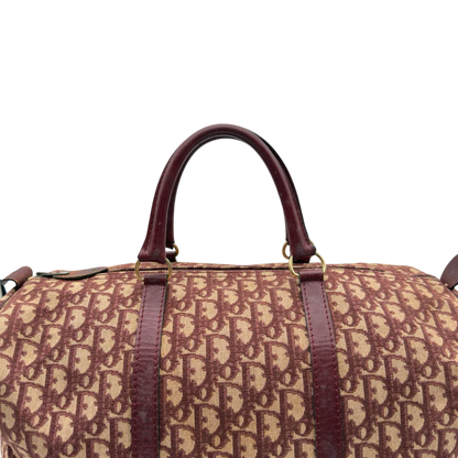 https://cdn.shopify.com/s/files/1/0564/9376/8855/files/Dior_Handtasche_Boston_40_vintage_monogram_beige_rot_11.webp?v=1784247347
