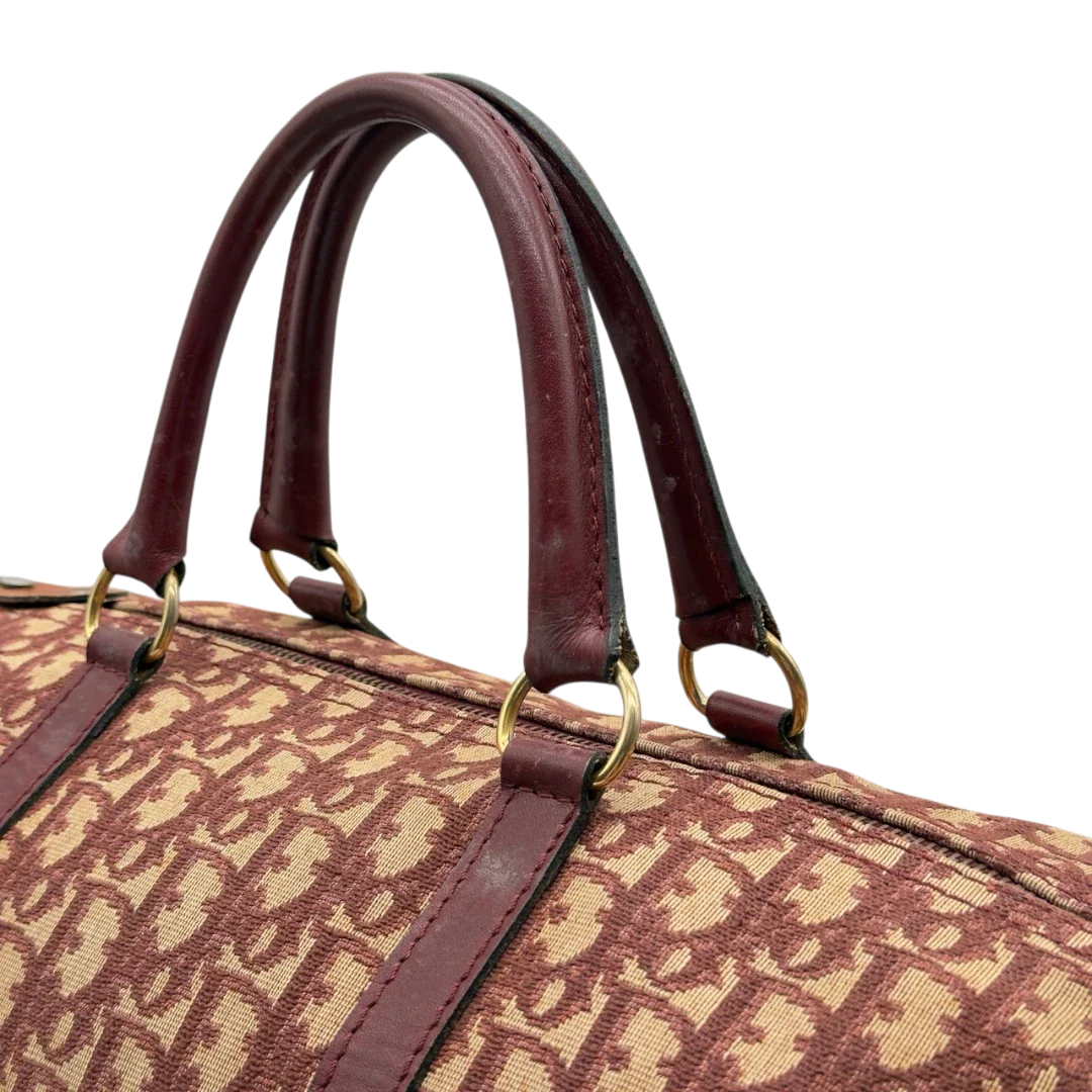 https://cdn.shopify.com/s/files/1/0564/9376/8855/files/Dior_Handtasche_Boston_40_vintage_monogram_beige_rot_13.webp?v=1784247348