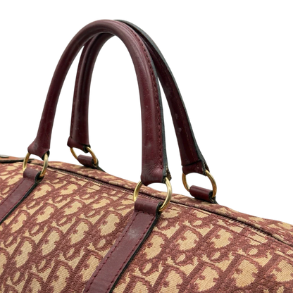 https://cdn.shopify.com/s/files/1/0564/9376/8855/files/Dior_Handtasche_Boston_40_vintage_monogram_beige_rot_13.webp?v=1784247348