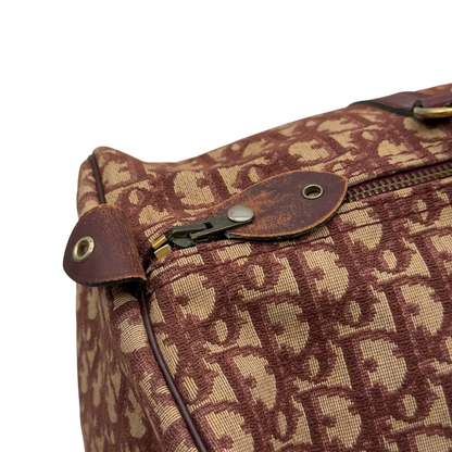 https://cdn.shopify.com/s/files/1/0564/9376/8855/files/Dior_Handtasche_Boston_40_vintage_monogram_beige_rot_16.webp?v=1784247348