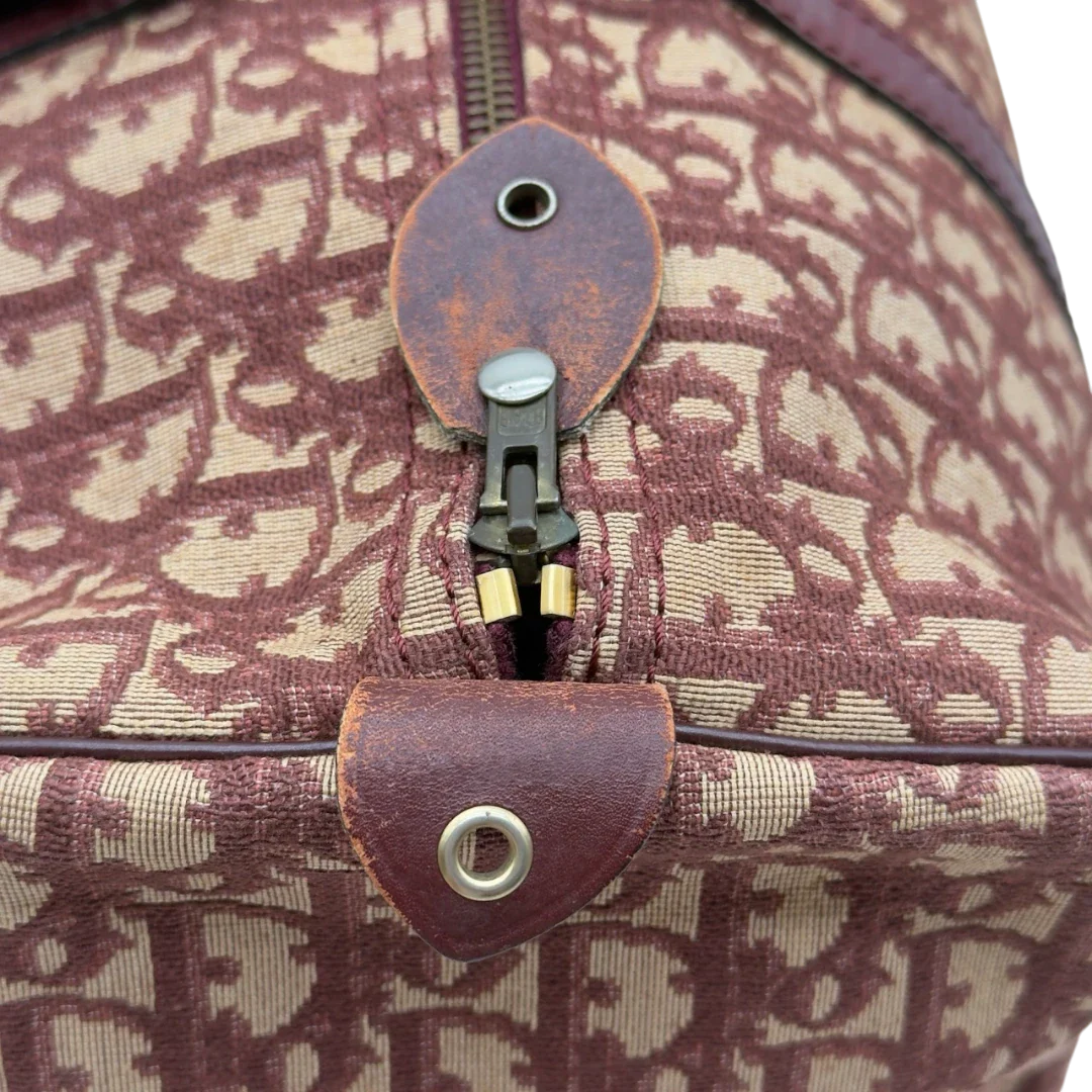 https://cdn.shopify.com/s/files/1/0564/9376/8855/files/Dior_Handtasche_Boston_40_vintage_monogram_beige_rot_17.webp?v=1784247348