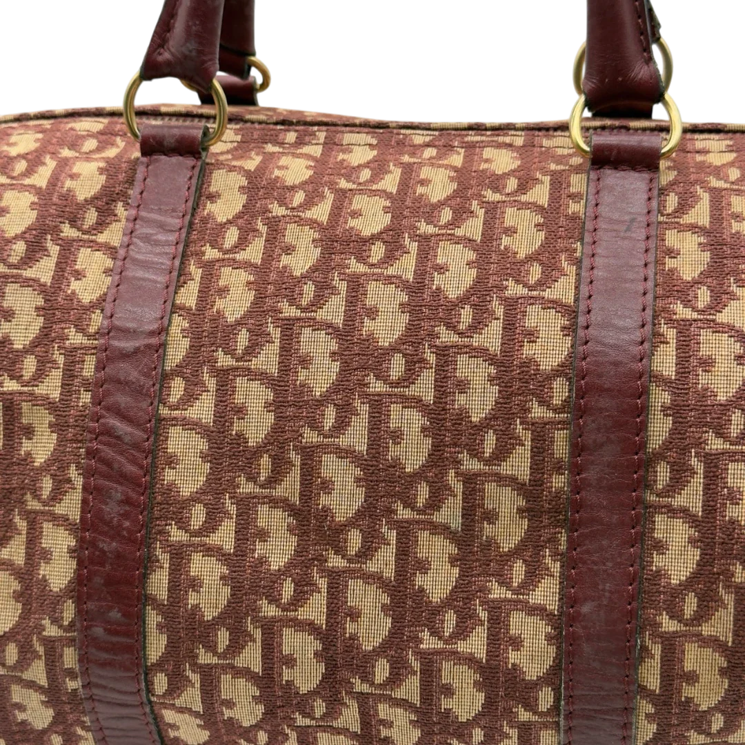 https://cdn.shopify.com/s/files/1/0564/9376/8855/files/Dior_Handtasche_Boston_40_vintage_monogram_beige_rot_18.webp?v=1784247347