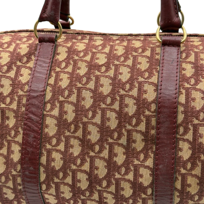 https://cdn.shopify.com/s/files/1/0564/9376/8855/files/Dior_Handtasche_Boston_40_vintage_monogram_beige_rot_18.webp?v=1784247347