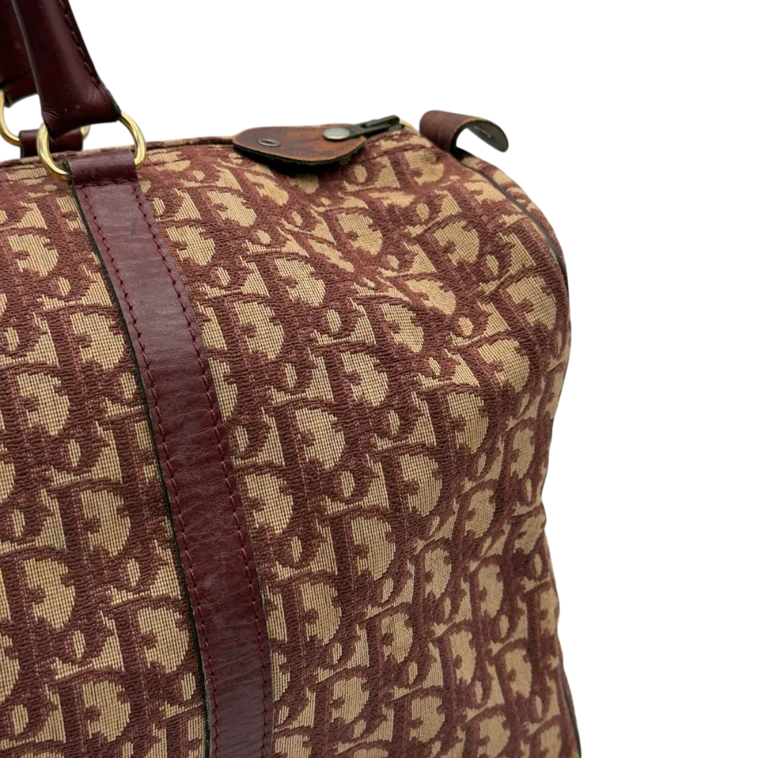 https://cdn.shopify.com/s/files/1/0564/9376/8855/files/Dior_Handtasche_Boston_40_vintage_monogram_beige_rot_19.webp?v=1784247348