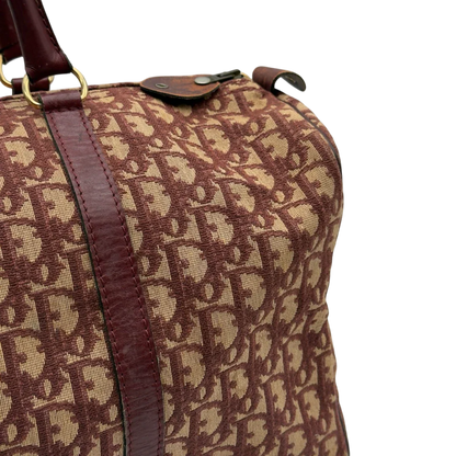 https://cdn.shopify.com/s/files/1/0564/9376/8855/files/Dior_Handtasche_Boston_40_vintage_monogram_beige_rot_19.webp?v=1784247348