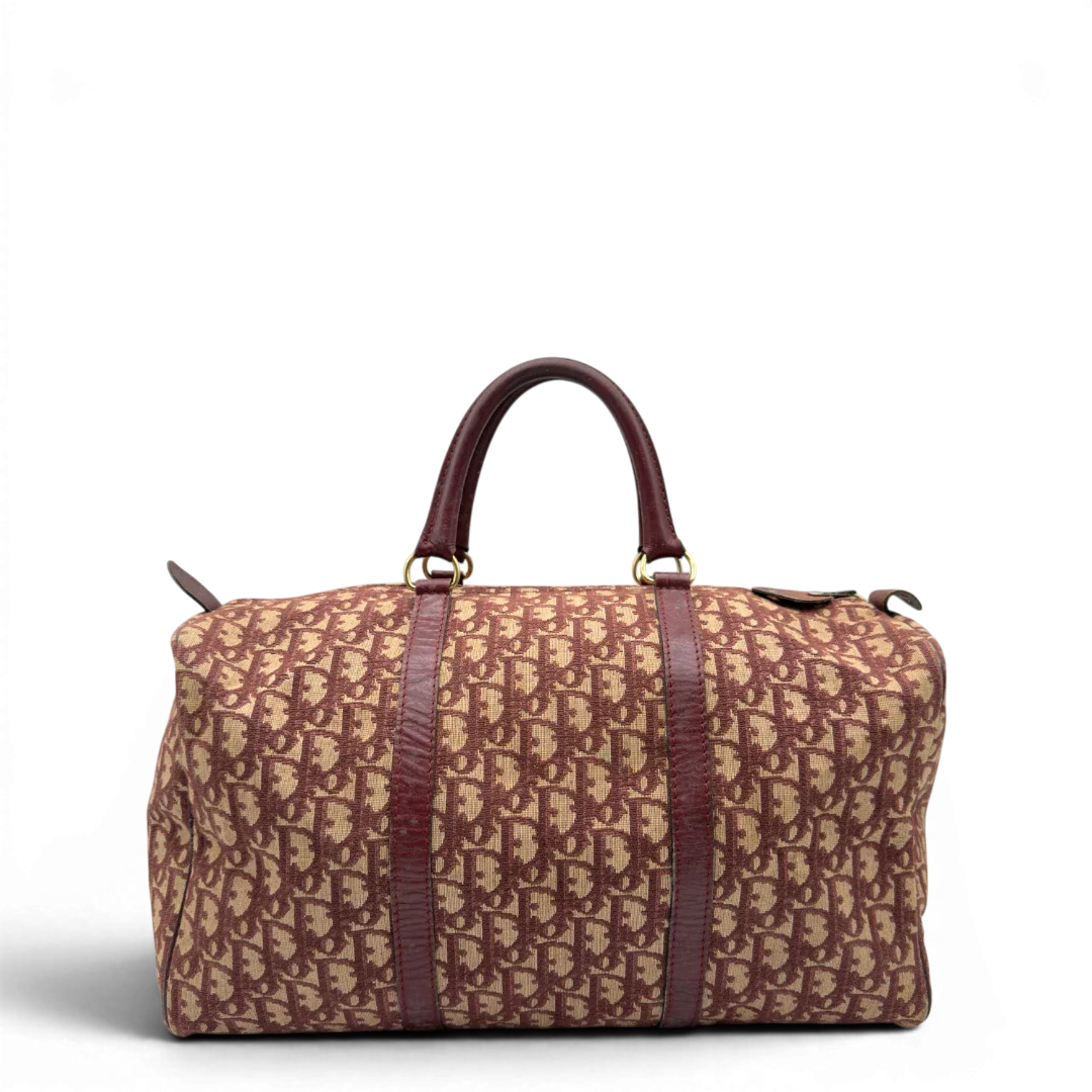 https://cdn.shopify.com/s/files/1/0564/9376/8855/files/Dior_Handtasche_Boston_40_vintage_monogram_beige_rot_2.webp?v=1784247347