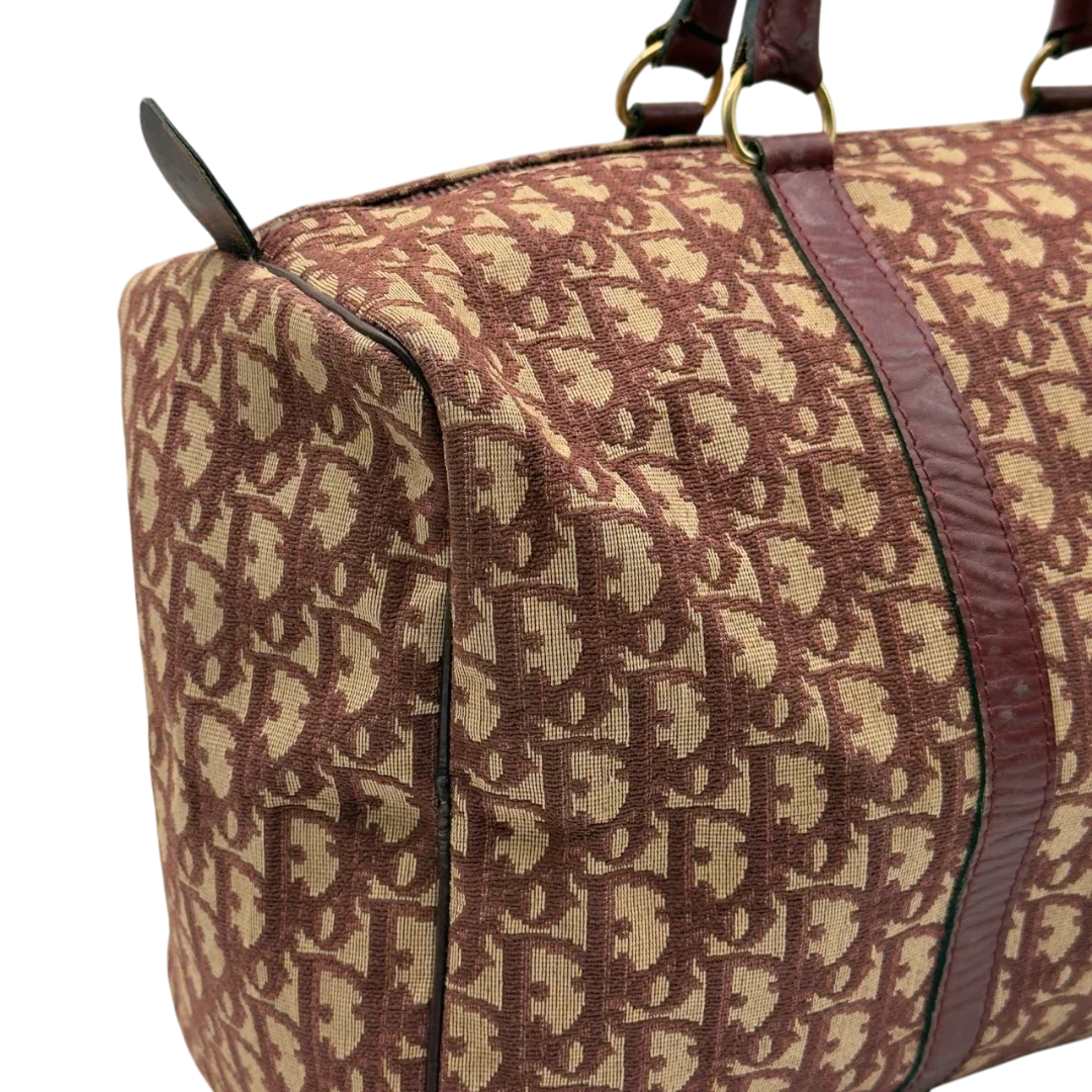 https://cdn.shopify.com/s/files/1/0564/9376/8855/files/Dior_Handtasche_Boston_40_vintage_monogram_beige_rot_20.webp?v=1784247348
