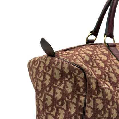 https://cdn.shopify.com/s/files/1/0564/9376/8855/files/Dior_Handtasche_Boston_40_vintage_monogram_beige_rot_21.webp?v=1784247347