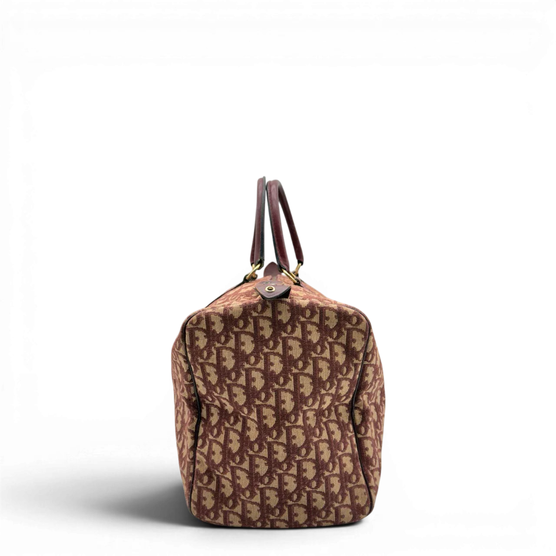 https://cdn.shopify.com/s/files/1/0564/9376/8855/files/Dior_Handtasche_Boston_40_vintage_monogram_beige_rot_3.webp?v=1784247347