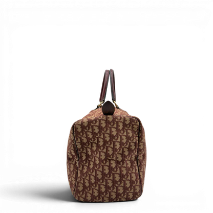 https://cdn.shopify.com/s/files/1/0564/9376/8855/files/Dior_Handtasche_Boston_40_vintage_monogram_beige_rot_4.webp?v=1784247347