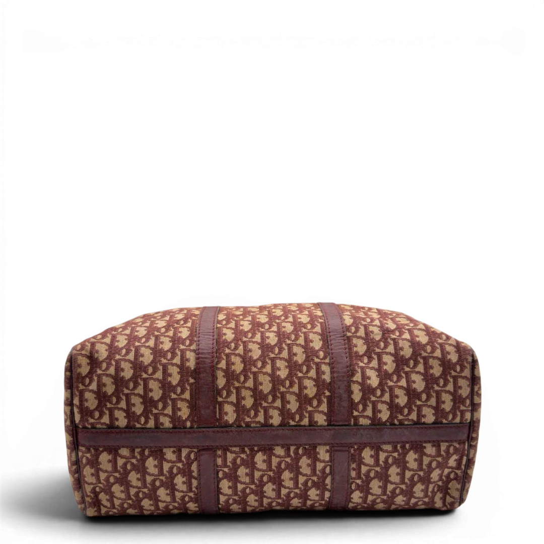https://cdn.shopify.com/s/files/1/0564/9376/8855/files/Dior_Handtasche_Boston_40_vintage_monogram_beige_rot_5.webp?v=1784247347