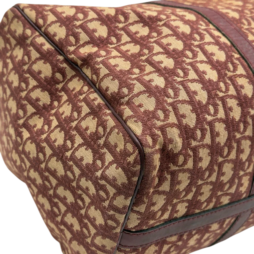 https://cdn.shopify.com/s/files/1/0564/9376/8855/files/Dior_Handtasche_Boston_40_vintage_monogram_beige_rot_7.webp?v=1784247348