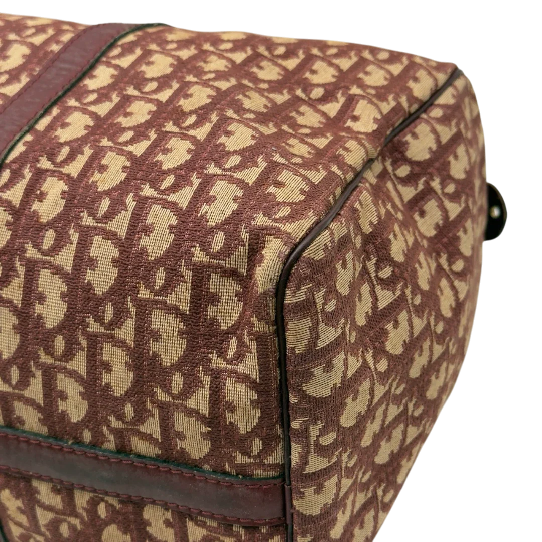 https://cdn.shopify.com/s/files/1/0564/9376/8855/files/Dior_Handtasche_Boston_40_vintage_monogram_beige_rot_8.webp?v=1784247348