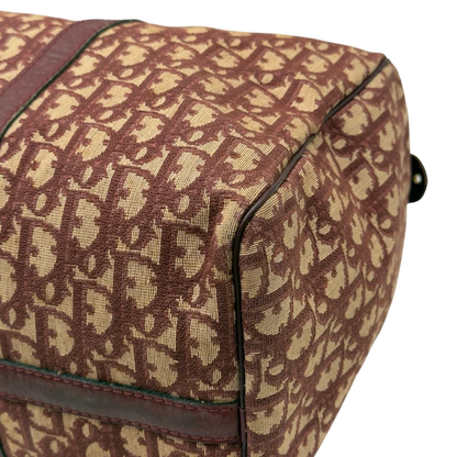 https://cdn.shopify.com/s/files/1/0564/9376/8855/files/Dior_Handtasche_Boston_40_vintage_monogram_beige_rot_8.webp?v=1784247348