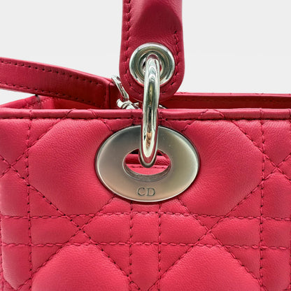 https://cdn.shopify.com/s/files/1/0564/9376/8855/files/Dior_Handtasche_Lady_Dior_aus_Lammleder_rosa_vintage_handbag2731.webp?v=1762520810