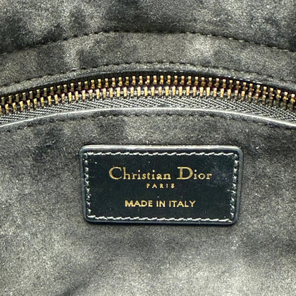 https://cdn.shopify.com/s/files/1/0564/9376/8855/files/Dior_Handtasche_Lady_Dior_medium_aus_Lammleder_schwarz_vintage1.webp?v=1780486576