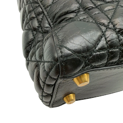 https://cdn.shopify.com/s/files/1/0564/9376/8855/files/Dior_Handtasche_Lady_Dior_medium_aus_Lammleder_schwarz_vintage8409.webp?v=1780486576