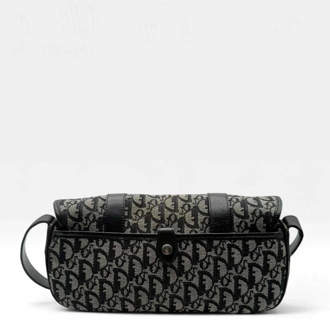 https://cdn.shopify.com/s/files/1/0564/9376/8855/files/Dior_Umhangetasche_mit_Schnallen_monogram_beige___schwarz_vintage_designer_crossbody7315.webp?v=1756379694